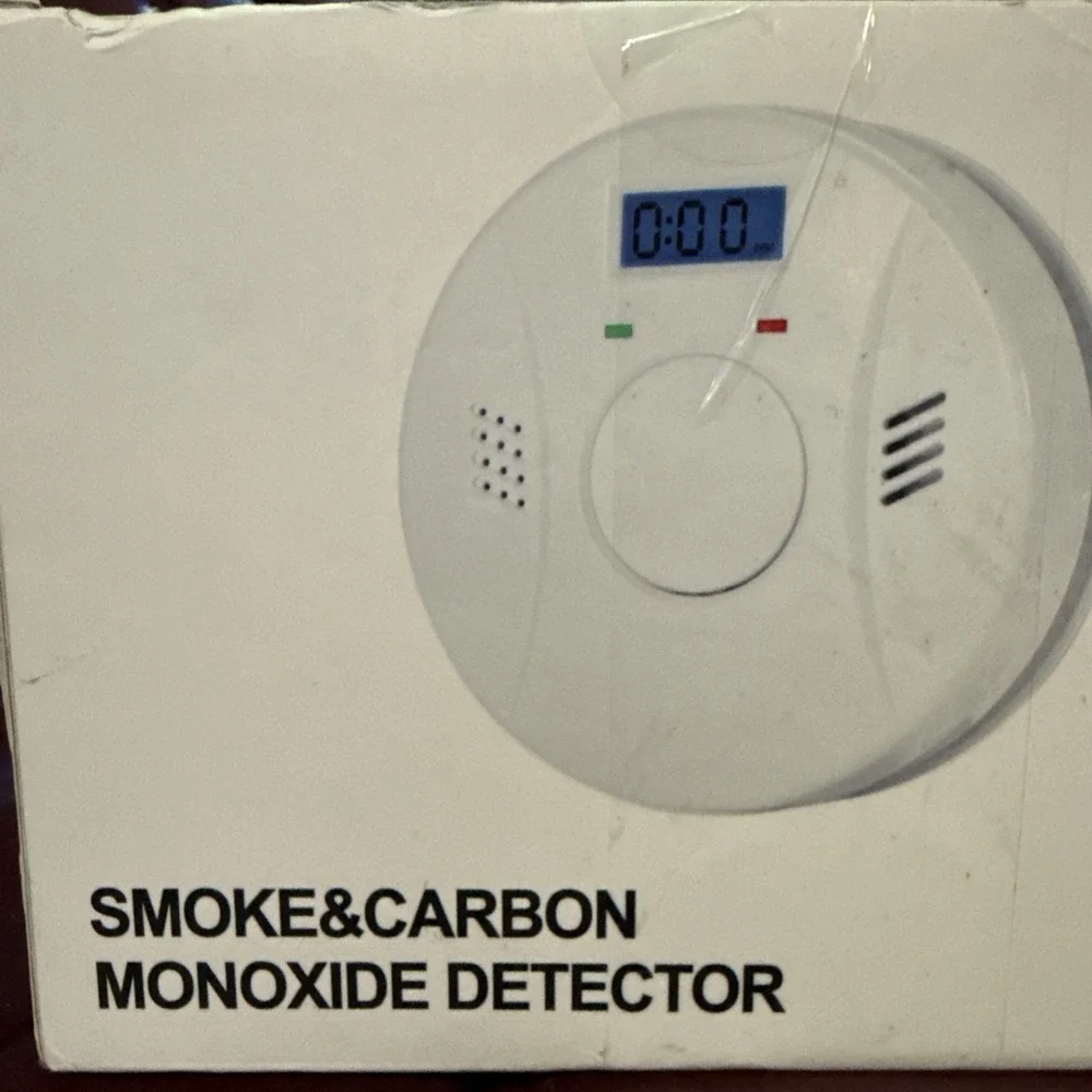 SMOKE & CARBON MONOXIDE DETECTOR WITH TEST AND RESET BUTTOM LCD  (4 PACK) Sealed